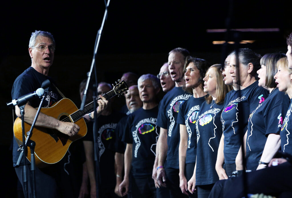 Ashburton community choir performing with conductor